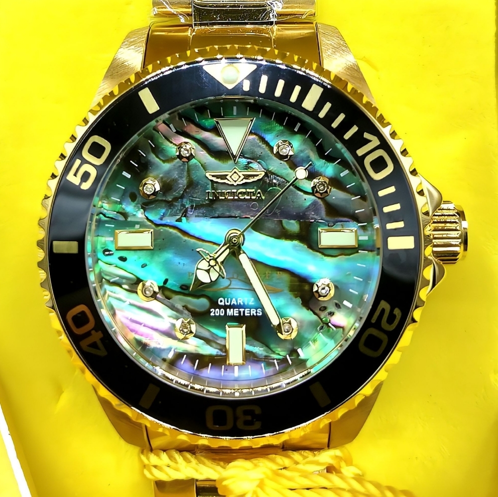 FIRM PRICE-New Invicta 0.0336 Carat Diamond w/Abalone Dial.( WATCH ONLY)